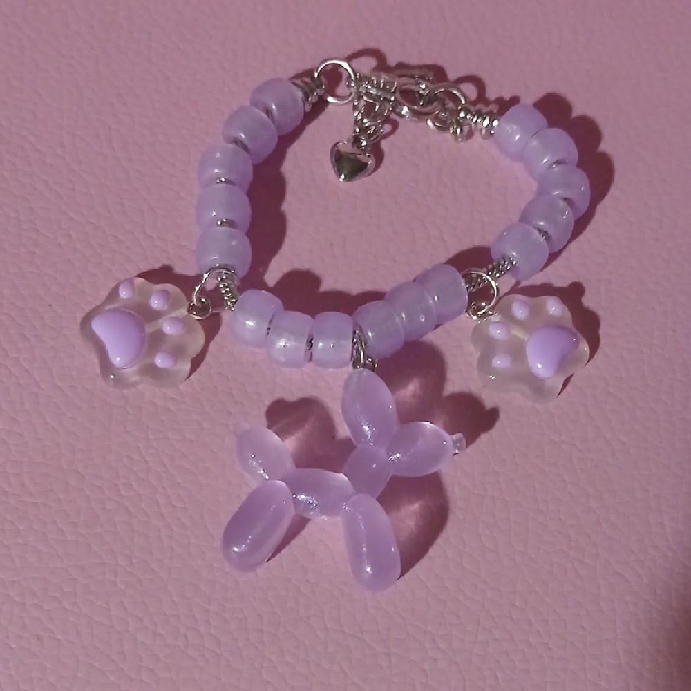 Purple Beaded Bracelet with Charms